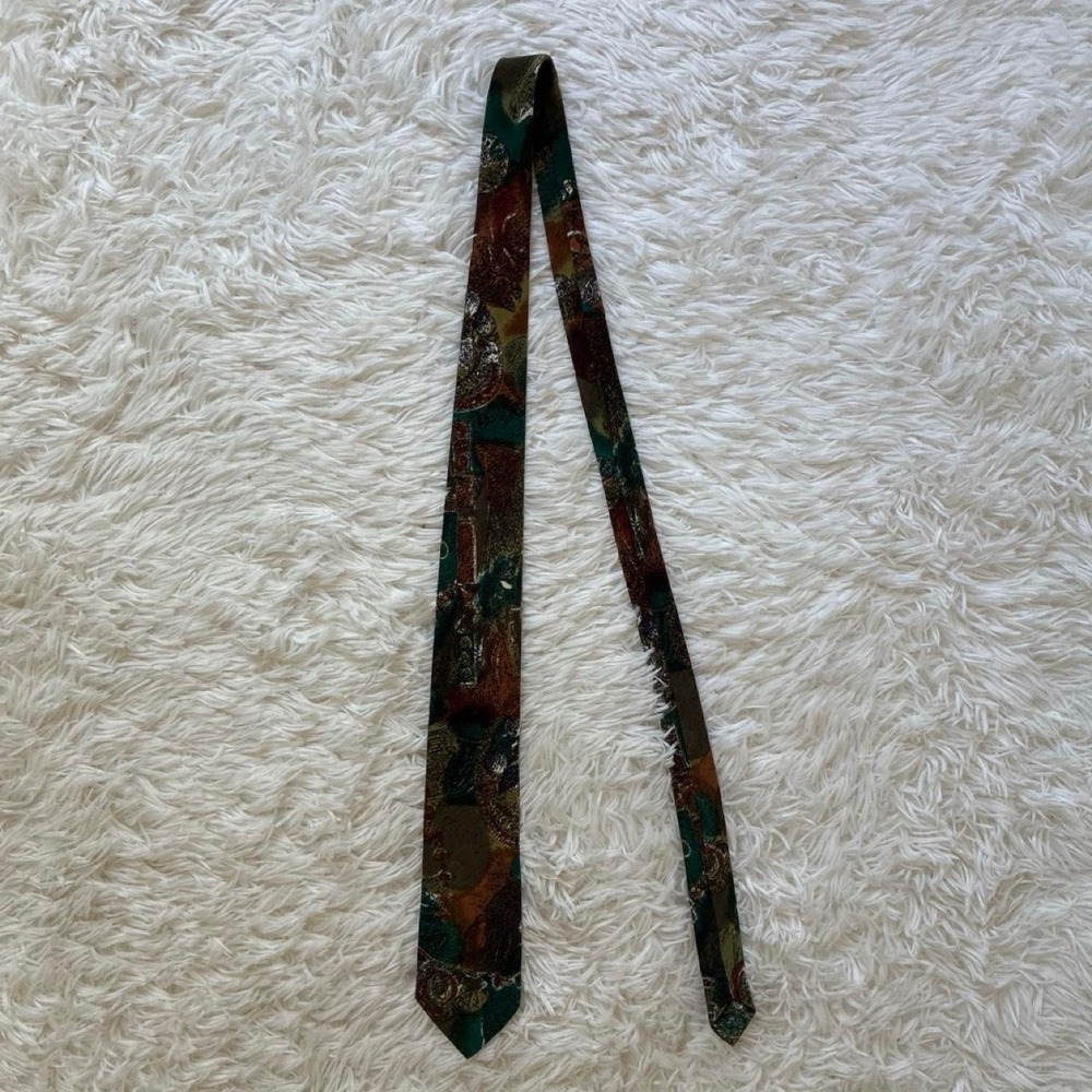Vintage Jordache Brown and green paisley tie with abstract shapes and figures